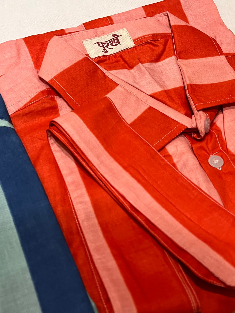 Peach stripe close up, with the matching fabric belt
